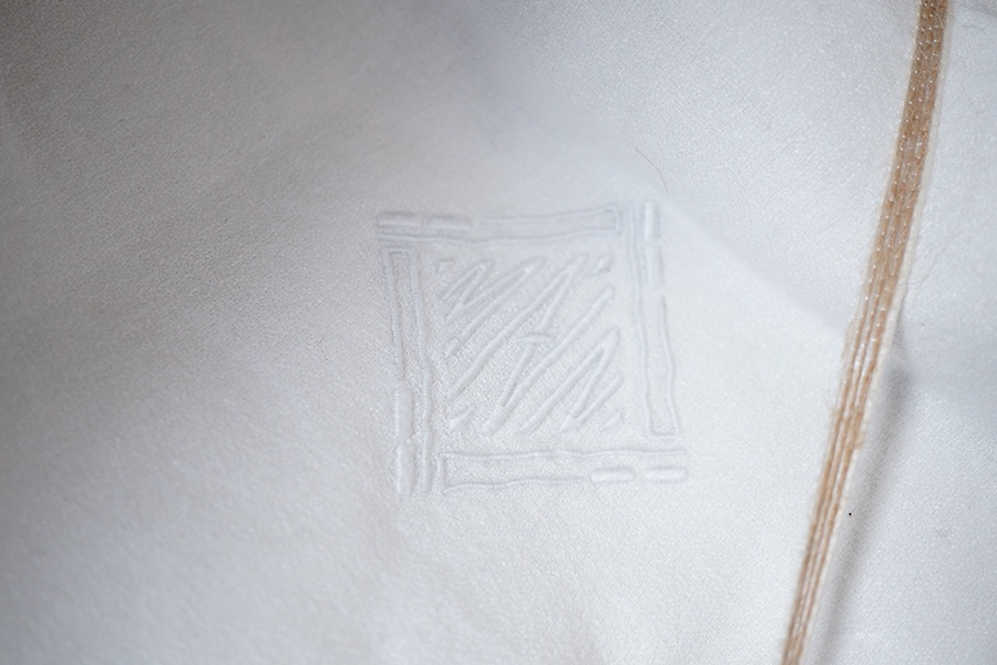 A collection of four sets of ten monogrammed French linen napkins and a similar set of twelve napkins, various odd sets of English Damask napkins, a large damask table cloth and a set of hand towels.